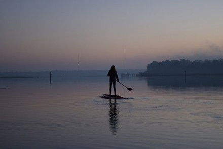resort-girl-paddle-board